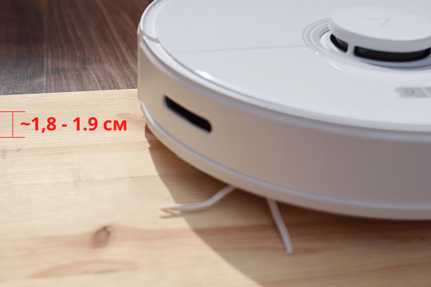 Roborock Q7 Max Robot Vacuum Cleaner crosses a doorstep.